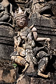 Elaborate figures carved in stucco decorate the ancient stupas, Kakku Buddhist Ruins. Shan State in Myanmar (Burma).